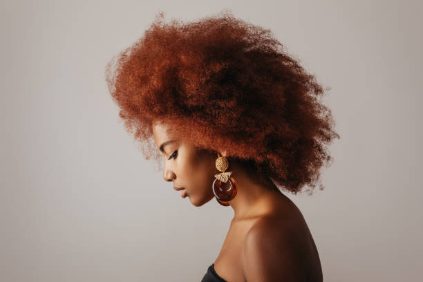 istock Beautiful afro girl with earrings 1243857096