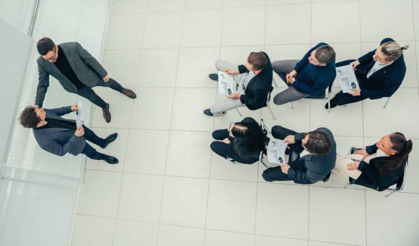 istock boss congratulating the best employee during a work meeting 1243860013