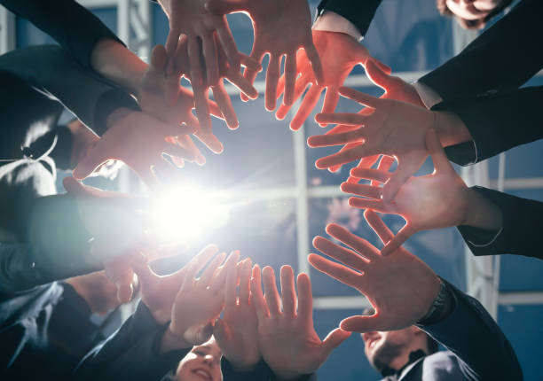 istock close up. young business team standing in a circle 1243863636