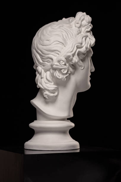 istock White gypsum statue of Apollo's head 1243863645