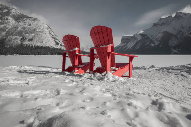 istock Red Deck Chairs on Frozen Lake 1243874014