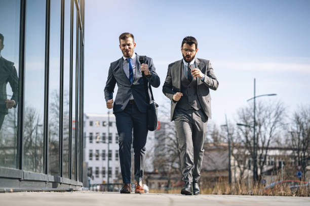 istock Happy corporate employees leaving work 1243929187