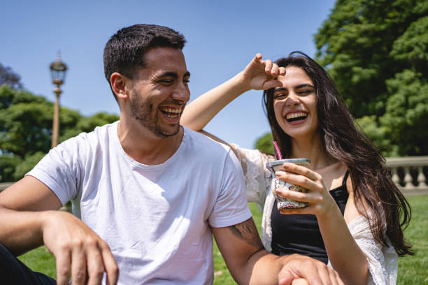 istock Man and woman bonding while drinking mate 1243951034