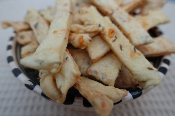istock Appetizer cookies with cheese and cumin in a bowl 1243964994