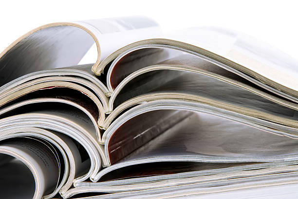 istock Pile of magazines with bending pages 124397440