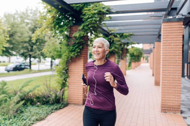 istock Senior woman jogging 1243997377