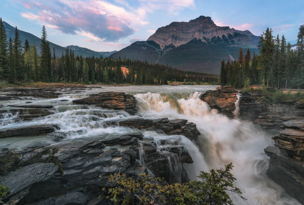 istock Running river with mountain in the background 1244013628