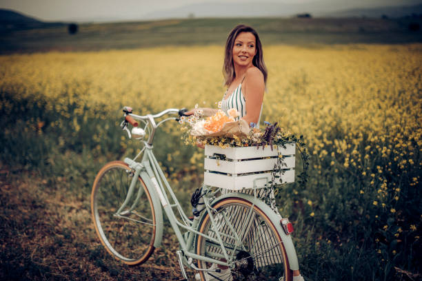 istock Lonely woman on bicycle 1244035577