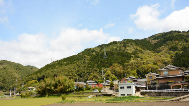 istock Cottages with back mountain in sunny April 1244047600