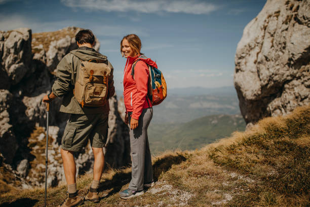 istock Group of hikers, walking over the mauntain 1244089631