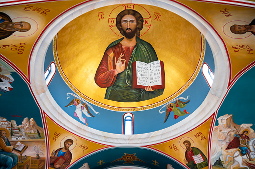Painted ceiling and dome of greek orthodox christian church dedicated to Saint Nicholas on outskirts of Paphos, Cyprus at Geroskipou