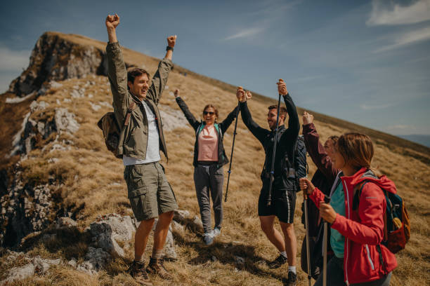 istock Group of hikers, walking over the mauntain 1244090890