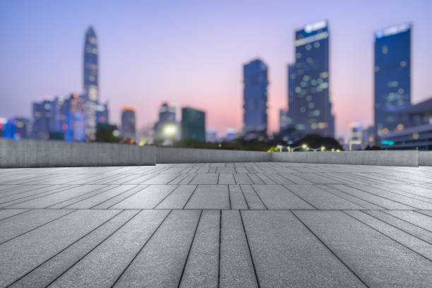 istock Panoramic skyline and buildings with empty square floor at dusk 1244145636