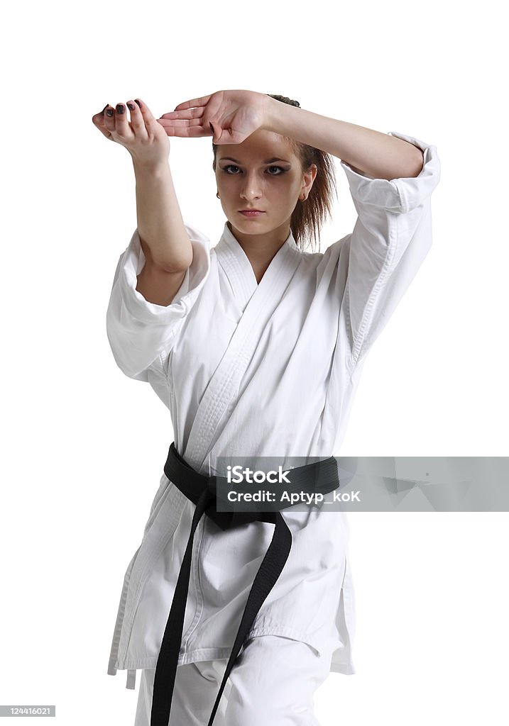 Karate. Giovane ragazza in kimono - Foto stock royalty-free di Adulto