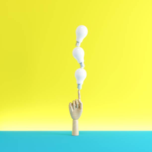 istock Wood hand Finger point to white light bulbs. Business Creative Idea. 3D Render. 1244174021