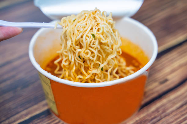 istock tom yum goond instant noodles in paper cup 1244203708