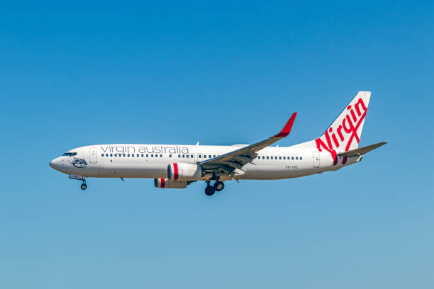 維珍澳大利亞vh-yvc(波音737-8fe)在adl機場ypad的最終方法 - 維珍集團 個照片及圖片檔