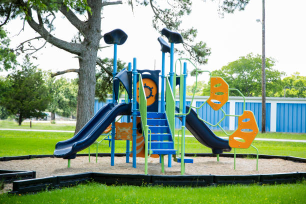 istock Empty school or neighborhood park playground. 1244290012