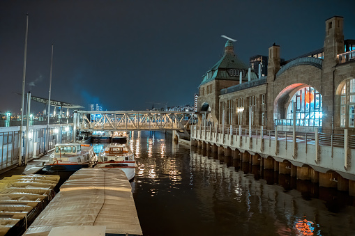 A small dock at night with colored lights in Hamburg