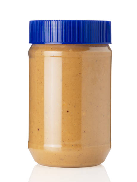 istock peanut butter with blue lid placed on a white background 1244333701