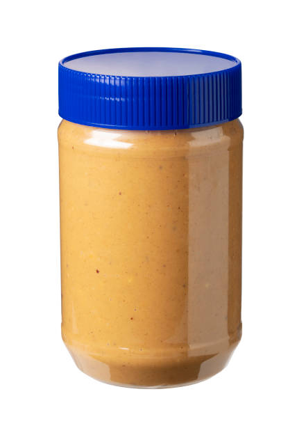 istock peanut butter with blue lid placed on a white background 1244335825