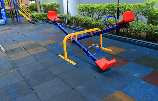 Empty double seesaws at playground stock photo