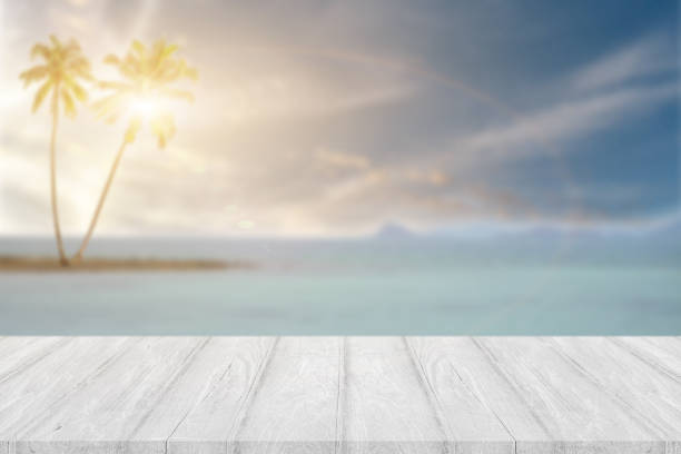 istock Perspective empty wood table on top over blur summer background 1244378187