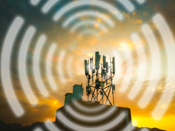 istock Mobile phone telecommunication tower at sunset 1244399879