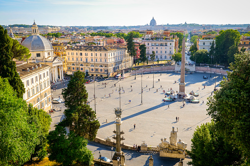 Rome, Italy, June 01 -- A panoramic view of Piazza del Popolo taken from Villa Borghese with the twins church Santa Maria dei Miracoli and Santa Maria in Montesanto, and in the middle Via del Corso, in the heart of the baroque Rome. Image in HD format.