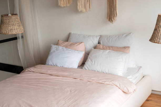 istock Beautiful bed with beautiful soft linen 1244442406