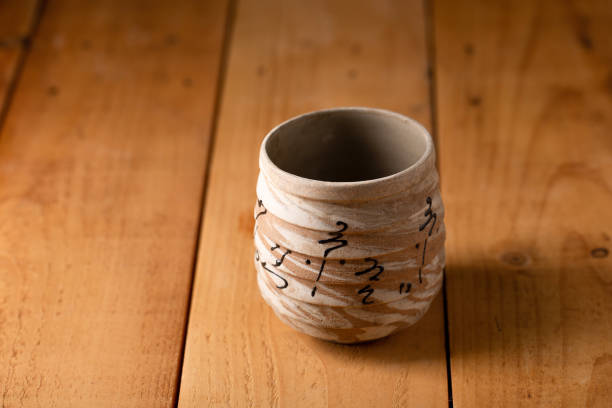 istock White ceramic mug on a wooden floor table 1244443513