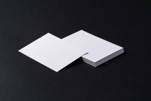 istock White blank business cards on dark black background 1244454658