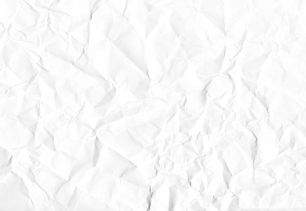 A background of white crumpled paper stock photo