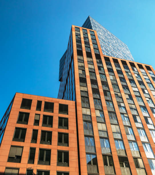 istock office building on a background of blue sky 1244469134