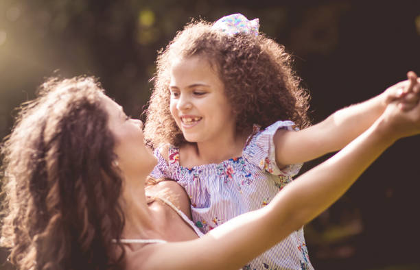 istock Mother and daughter in nature. 1244477368