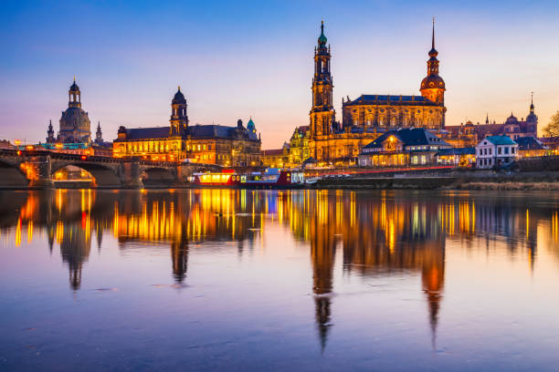 Dresden, Germany - Elbe River in Saxony Dresden, Germany. Cathedral of the Holy Trinity or Hofkirche, Bruehl's Terrace. Twilight sunset on Elbe river in Saxony. dresda stock pictures, royalty-free photos & images
