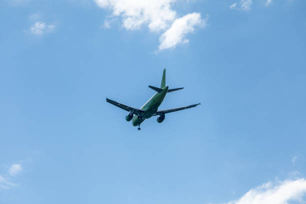 istock airplane in sky travel concept 1244481829