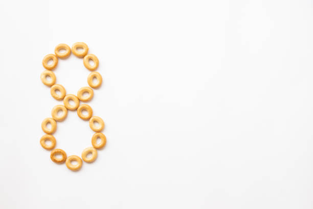 istock number 8 made from cookies on a white background with space for text. layout for school or diet 1244498918