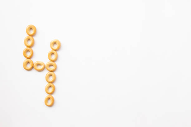 istock number 4 made from cookies on a white background with space for text. layout for school or diet 1244499992