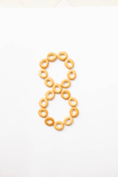 istock number 8 made from cookies on a white background with space for text. layout for school or diet 1244503327
