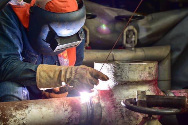 istock The welder is assembling valve to the pipe line with Tungsten Inert Gas Welding process (TIG) 1244510486
