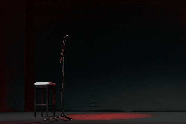 istock Free stage with lights, lighting devices on theater with red spot 1244511041