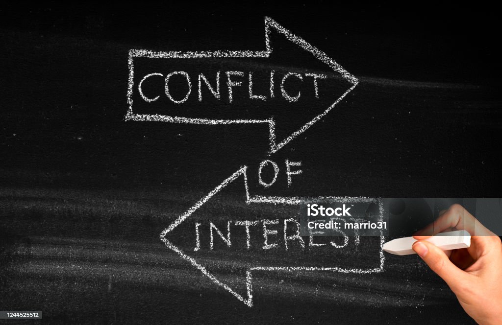 Conflict Of Interest Conflict Of Interest  concept on blackboard Conflict Stock Photo