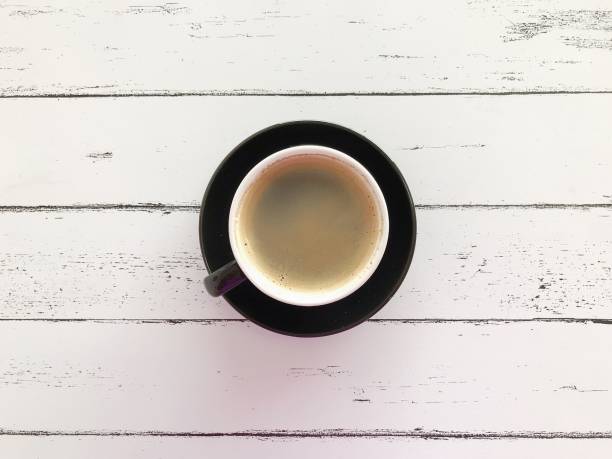 istock Coffee on a white wooden table 1244545650