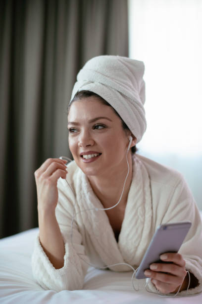 istock Beautiful young woman relaxing after bath 1244551756