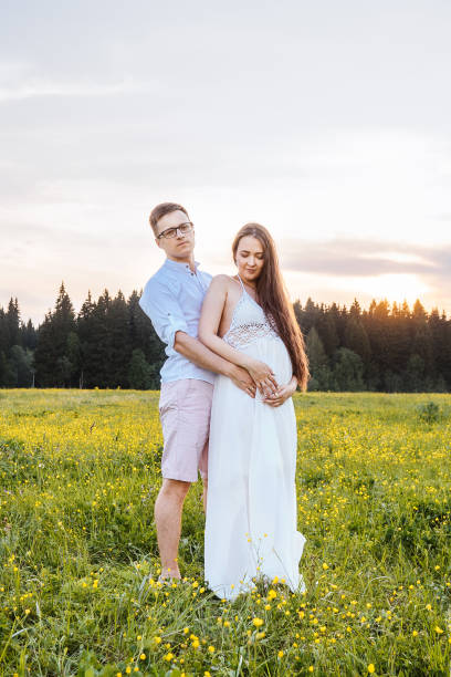 istock Loving couple in the field. Sunset. 1244555162