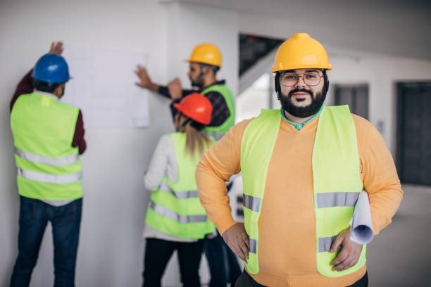 istock Portrait of young male architect on a construction site 1244564298
