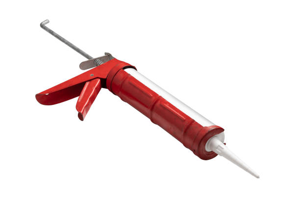 istock Work Tools: Caulk Gun Isolated on White Background 1244569909