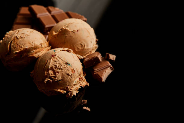 istock fresh delicious chocolate ice cream on black 1244581078