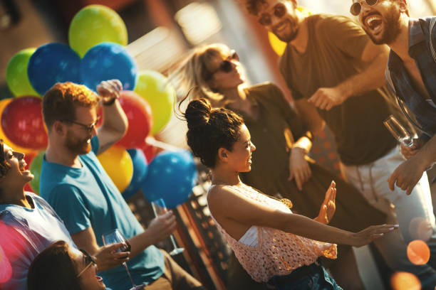 istock Rooftop party on a summer afternoon. 1244607707